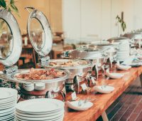 Selective focus point on Catering buffet in hotel restaurant - Vintage filter effect