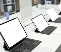 Tablets lined up on display at a shopping mall